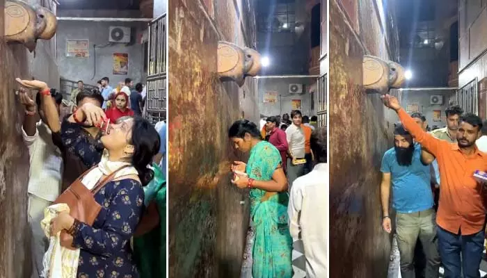 Devotees drink AC Water : దేవాలయంలో ఏసీ నుంచి కారుతున్న నీళ్లు.. తాగేందుకు ఎగబడుతున్న భక్తులు