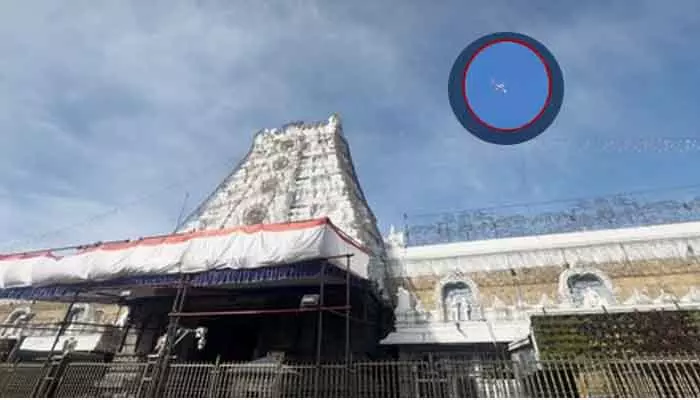 Tirumala : మరోసారి శ్రీవారి ఆలయ గోపురం పైనుంచి విమానం